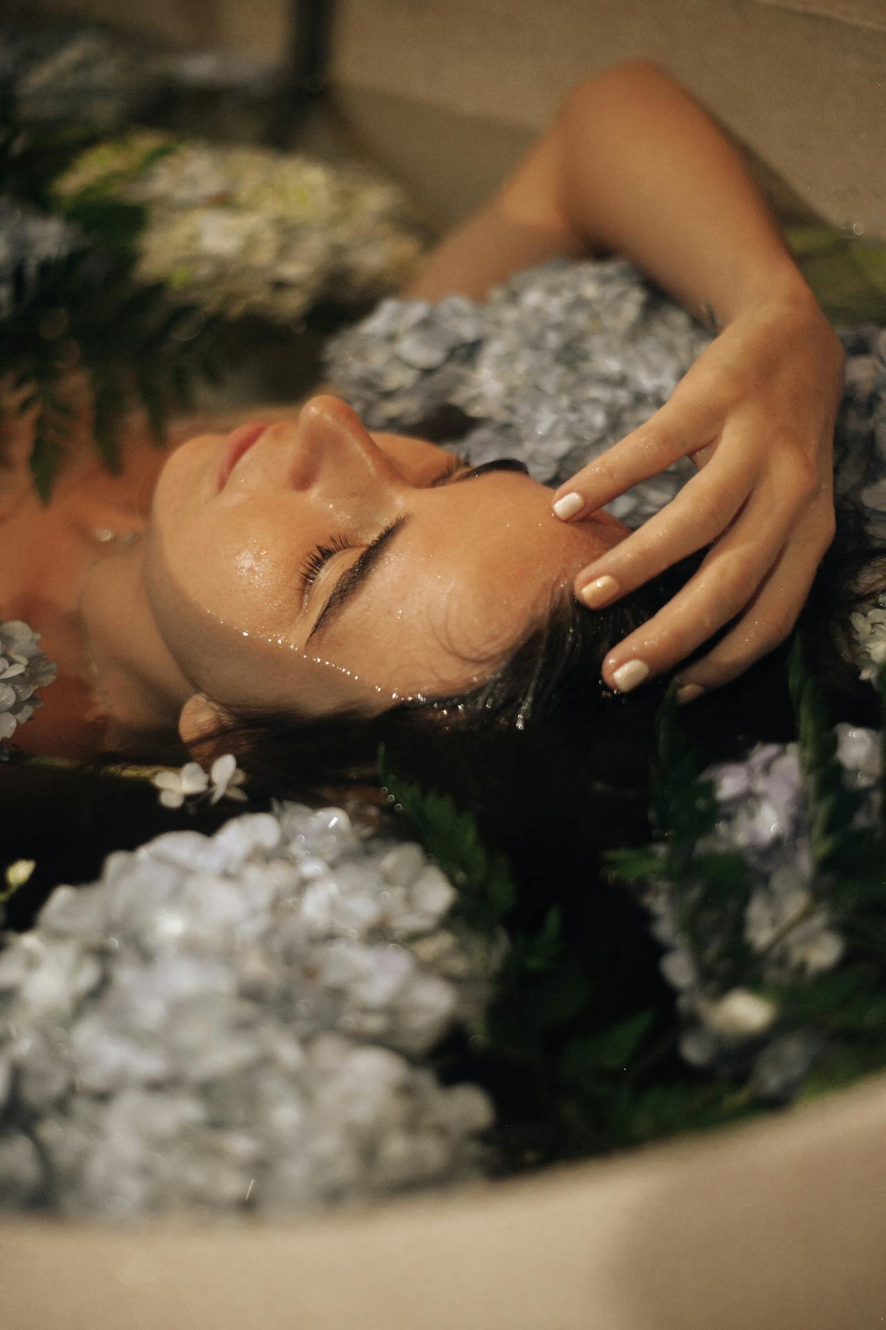 Tub tea with flowers means a relaxing bath soak for women.